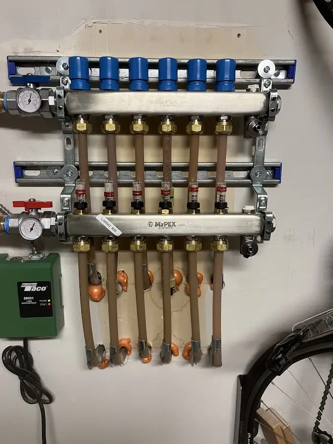 Plumber performing Gas Line Installation at a residential property in Stockbridge